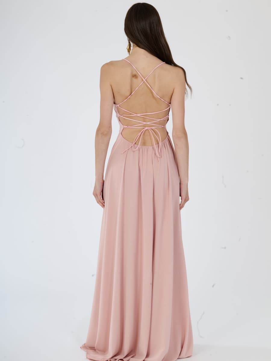 Abito elegante rosa con taglio avvolgente e gonna ampia, per occasioni speciali.