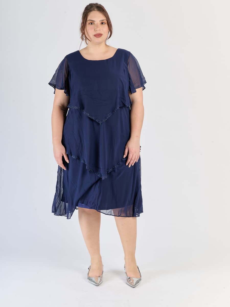 Vestito navy con pannelli sovrapposti, maniche corte traslucide e stile raffinato