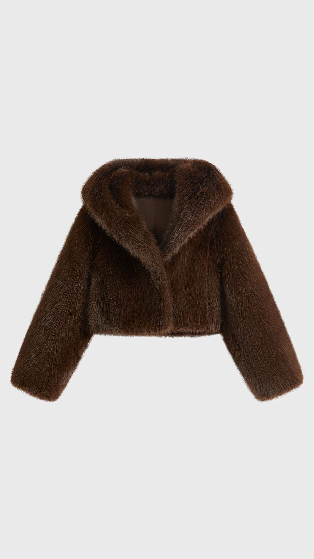 Giacca cropped in pelliccia sintetica con cappuccio ampio