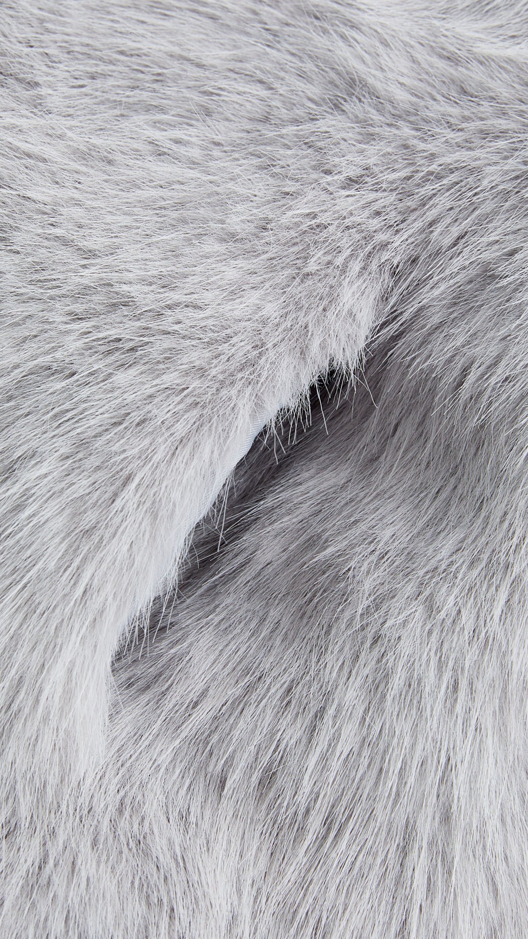 Giacca cropped in pelliccia sintetica con cappuccio ampio