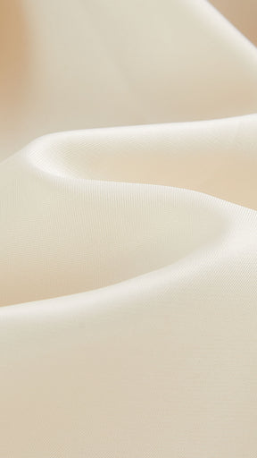 Giacca cropped in pelliccia sintetica con cappuccio ampio