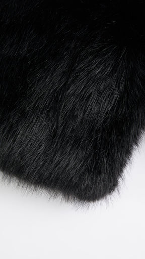 Giacca cropped in pelliccia sintetica con cappuccio ampio