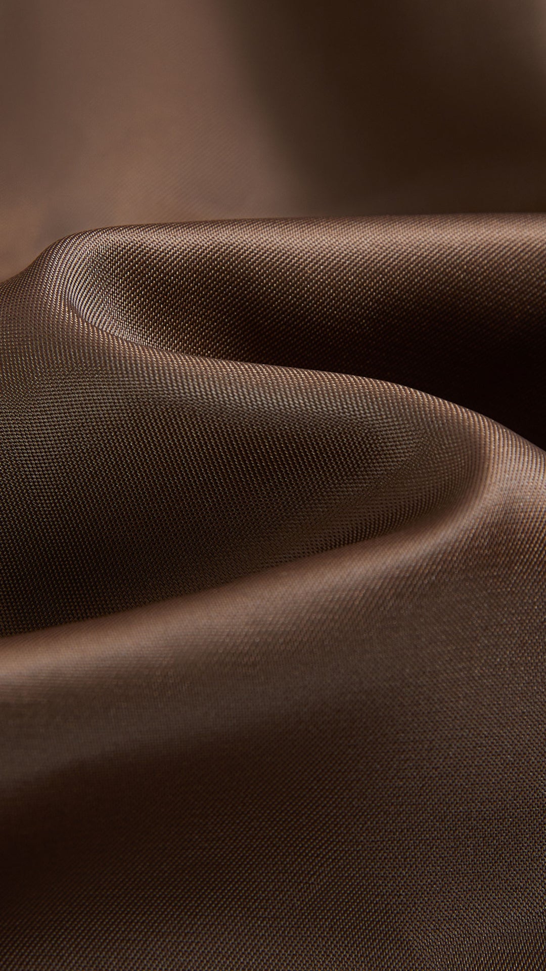 Cappotto corto in pelliccia sintetica con colletto a revers e cintura