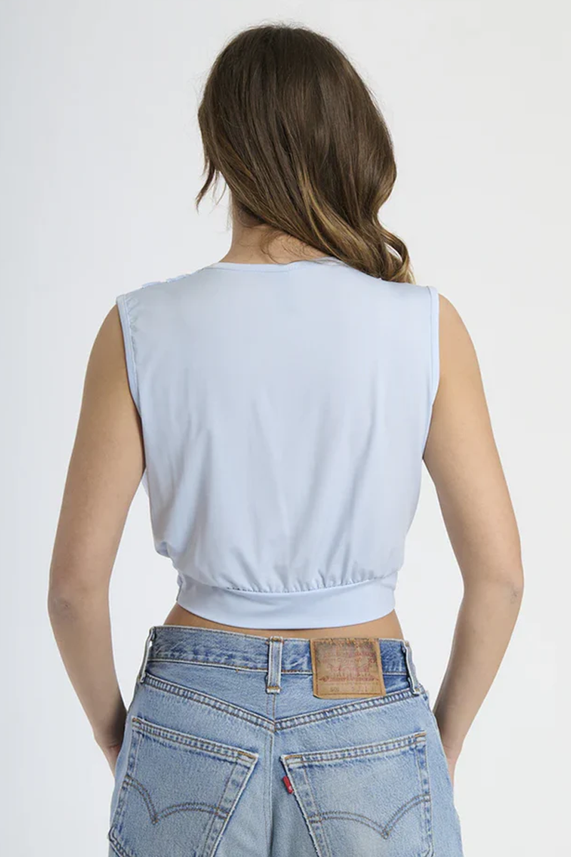 Top smanicato drappeggiato con decorazione Eliana