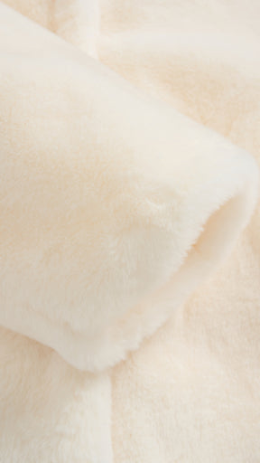 Cappotto medio in peluche sintetica con colletto a revers
