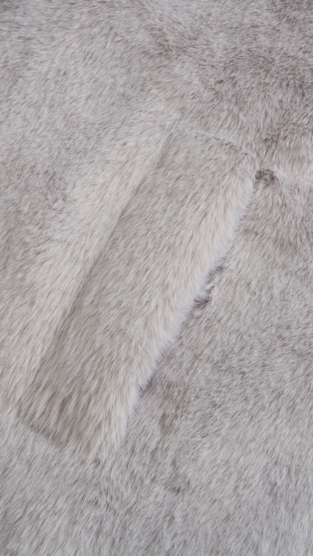 Cappotto medio in peluche sintetica con colletto a revers