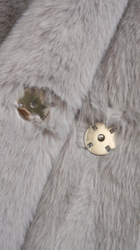 Cappotto medio in peluche sintetica con colletto a revers