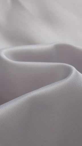 Cappotto medio in peluche sintetica con colletto a revers