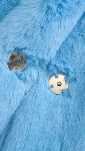 Cappotto medio in peluche sintetica con colletto a revers