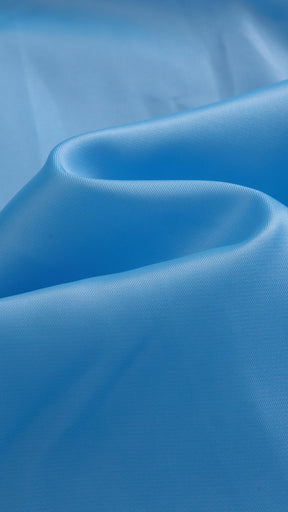 Cappotto medio in peluche sintetica con colletto a revers