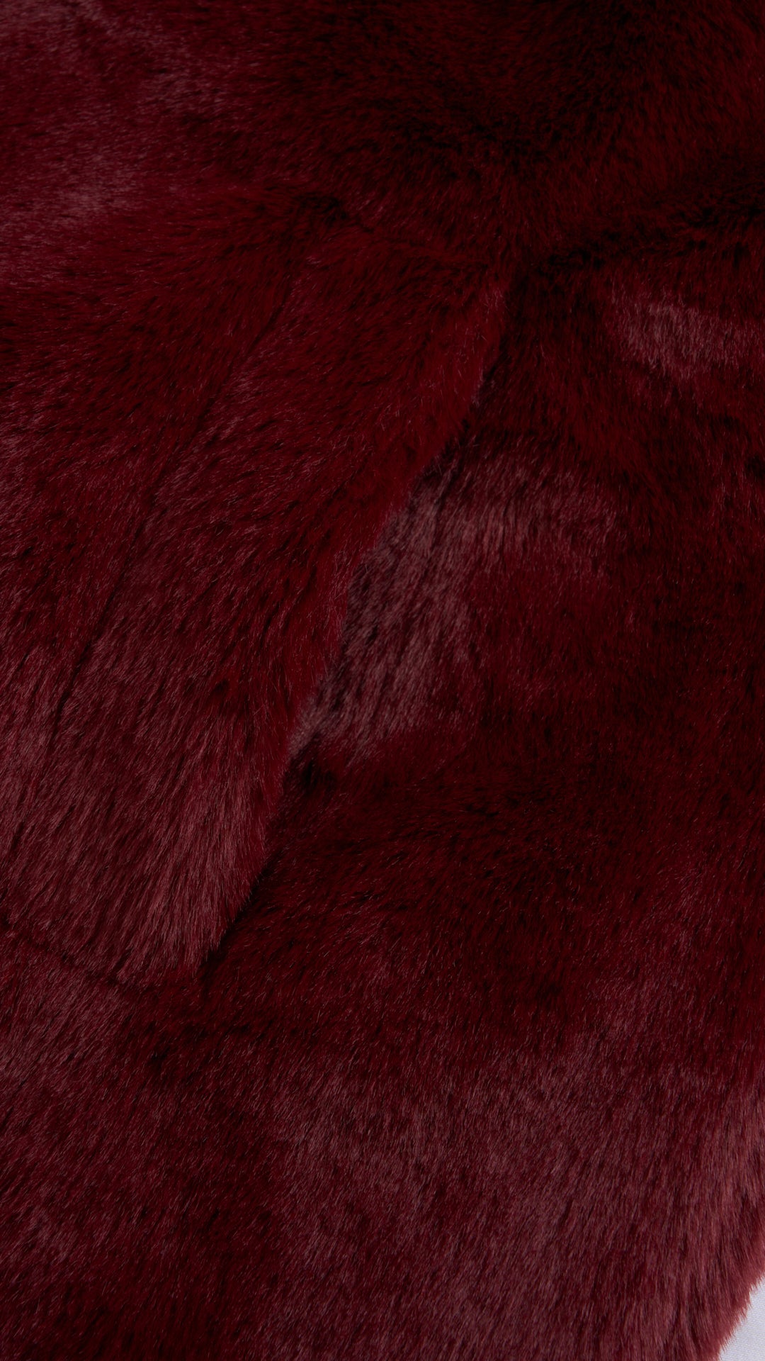 Cappotto medio in peluche sintetica con colletto a revers