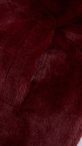 Cappotto medio in peluche sintetica con colletto a revers