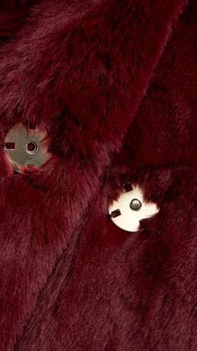 Cappotto medio in peluche sintetica con colletto a revers