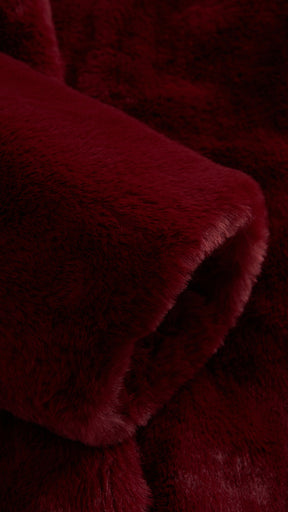 Cappotto medio in peluche sintetica con colletto a revers