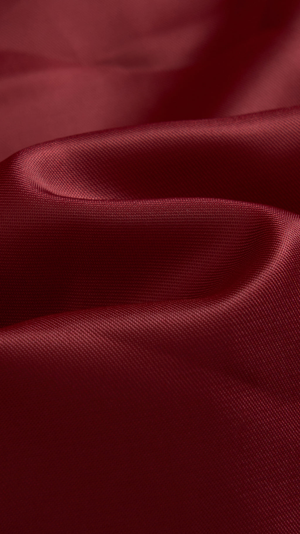 Cappotto medio in peluche sintetica con colletto a revers