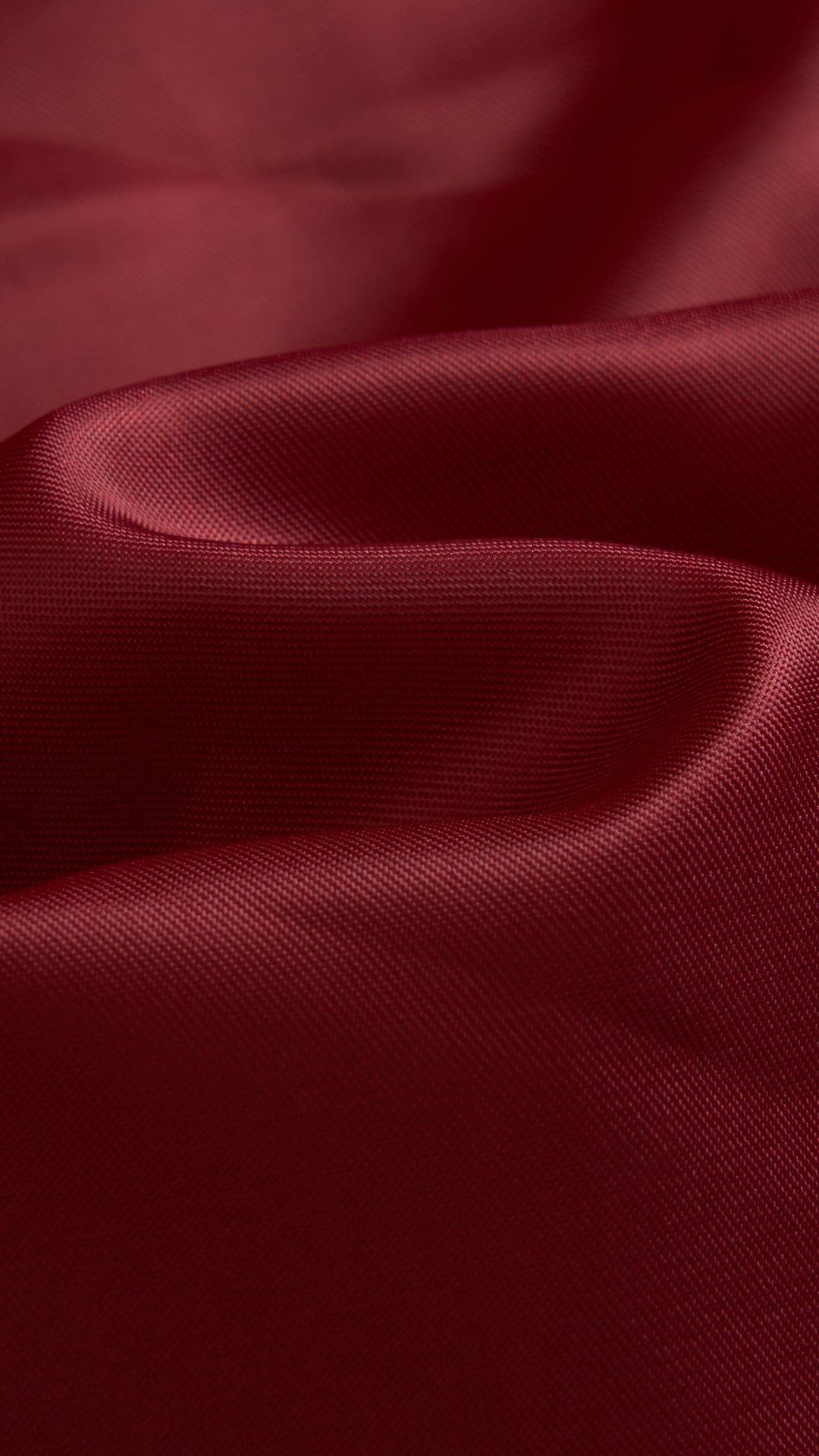 Cappotto medio in peluche sintetica con colletto a revers