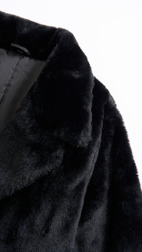 Cappotto medio in peluche sintetica con colletto a revers