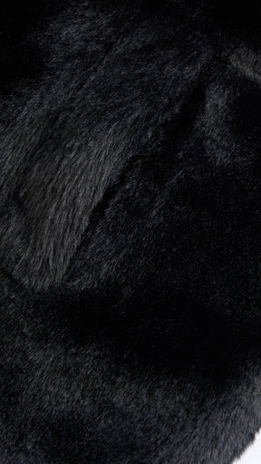 Cappotto medio in peluche sintetica con colletto a revers