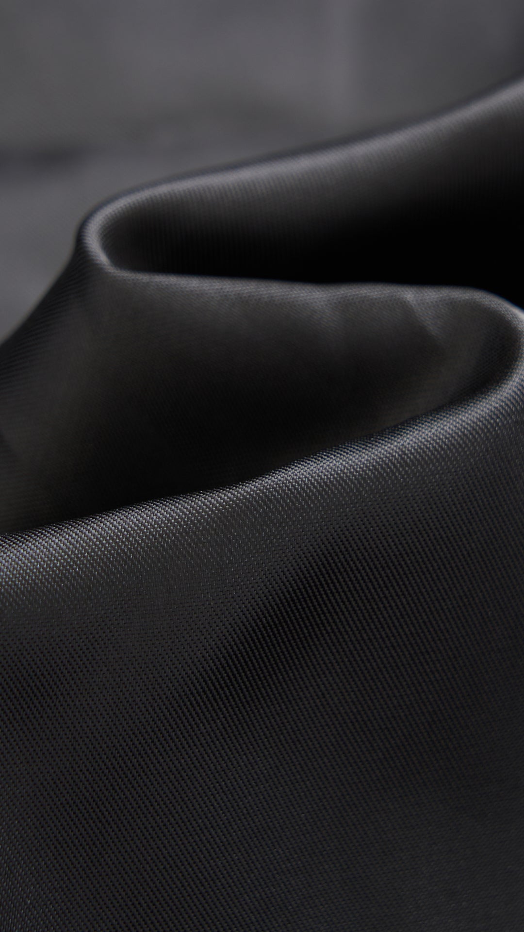 Cappotto medio in peluche sintetica con colletto a revers
