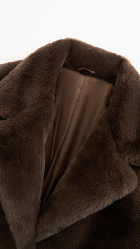 Cappotto lungo in peluche sintetica con colletto a revers