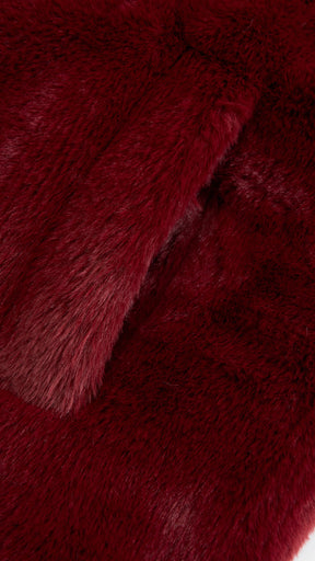 Cappotto lungo in peluche sintetica con colletto a revers