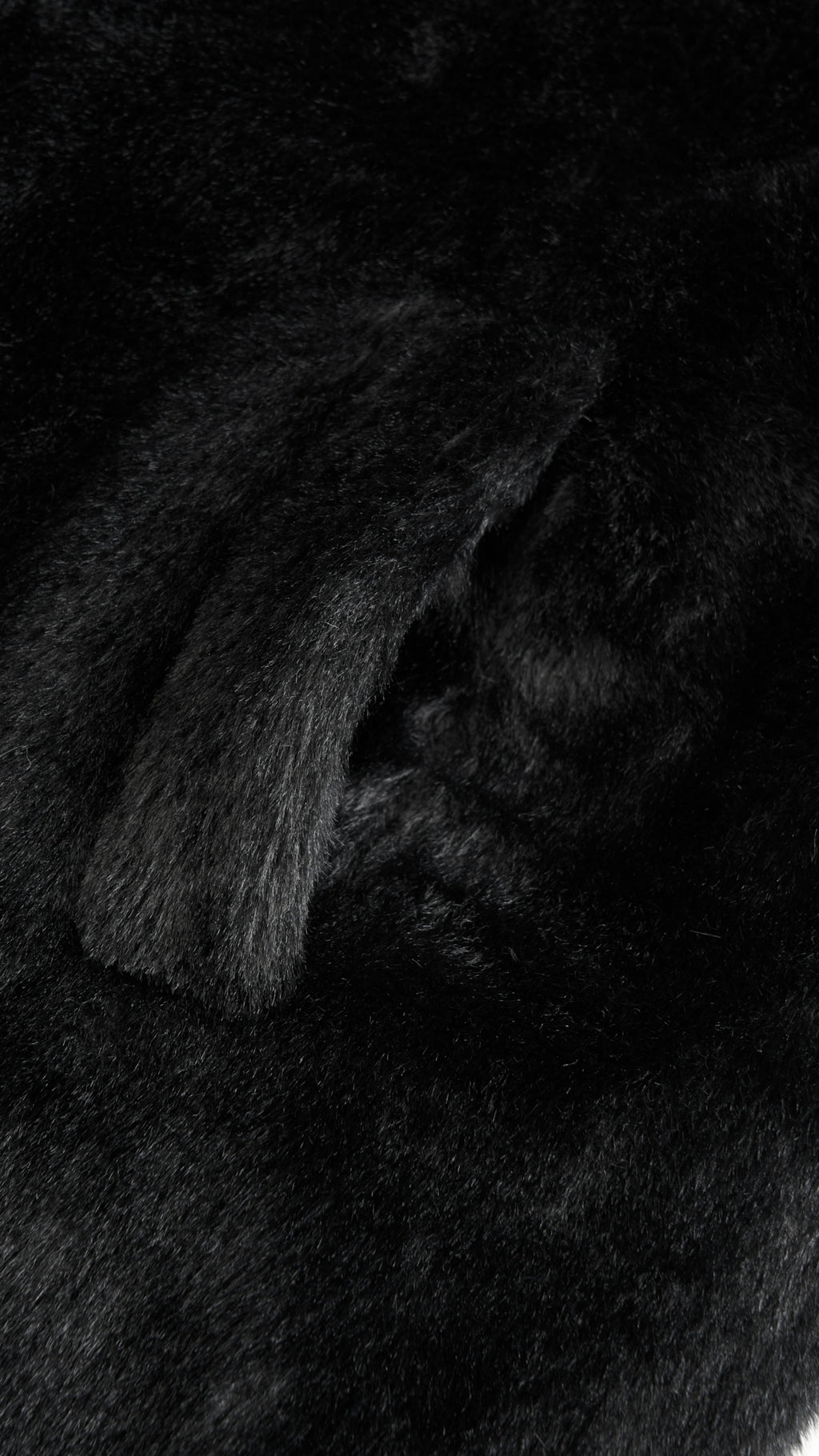 Cappotto lungo in peluche sintetica con colletto a revers