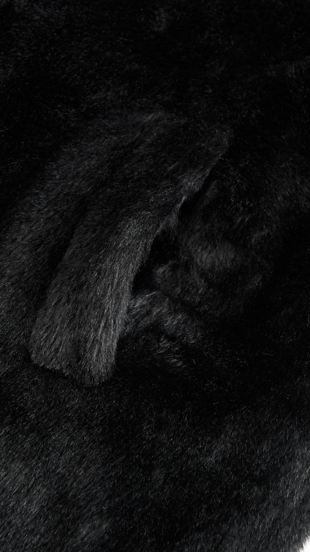 Cappotto lungo in peluche sintetica con colletto a revers
