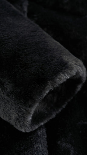 Cappotto lungo in peluche sintetica con colletto a revers