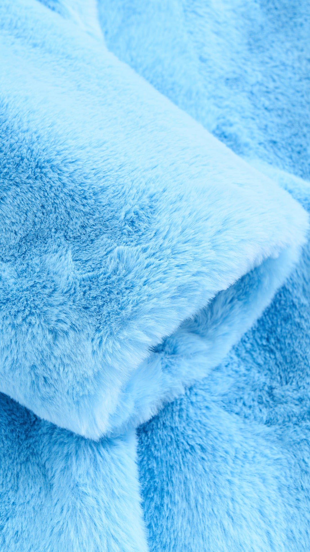 Cappotto lungo in peluche sintetica con colletto a revers
