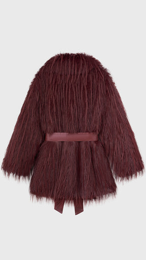 Cappotto corto in pelliccia sintetica a frange con cintura