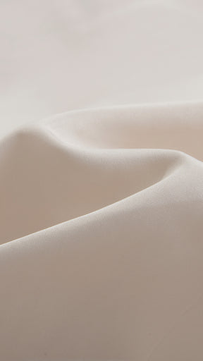Cappotto corto in pelliccia sintetica a frange con cintura