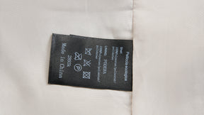 Cappotto corto in pelliccia sintetica a frange con cintura