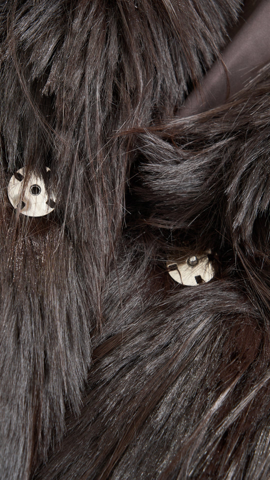 Cappotto corto in pelliccia sintetica a frange con cintura