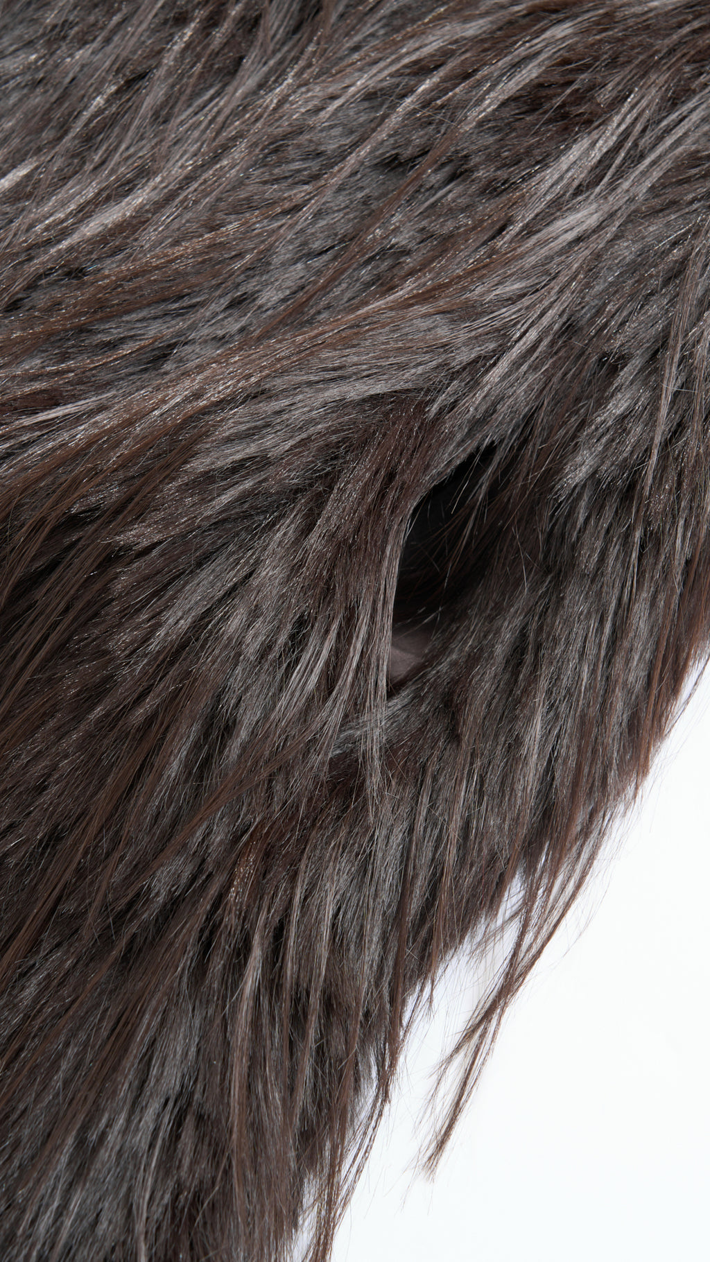 Cappotto corto in pelliccia sintetica a frange con cintura