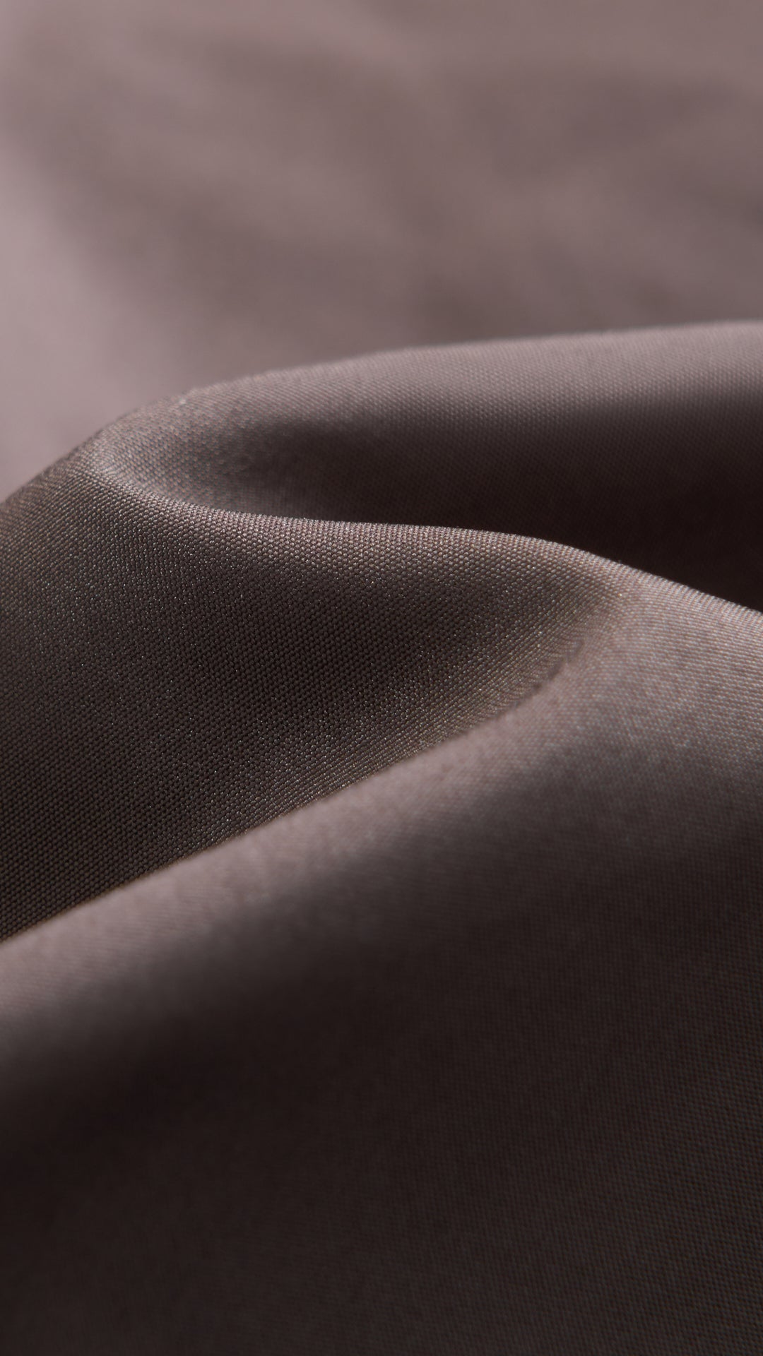 Cappotto corto in pelliccia sintetica a frange con cintura