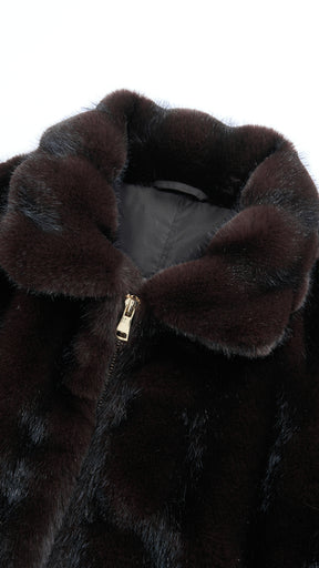 Giacca cropped in pelliccia sintetica con collo e zip frontale
