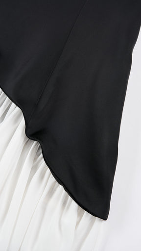 Abito lungo elegante con scollo a collo alto a fiocco, design bicolore con top asimmetrico e gonna fluida