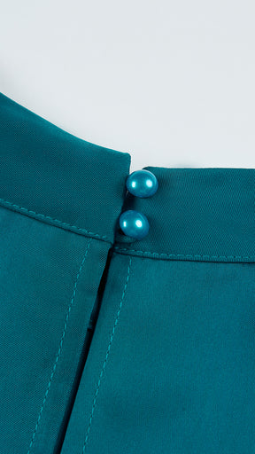 Abito lungo elegante con scollo a collo alto, senza maniche, in raso fluido, per cerimonie e occasioni speciali