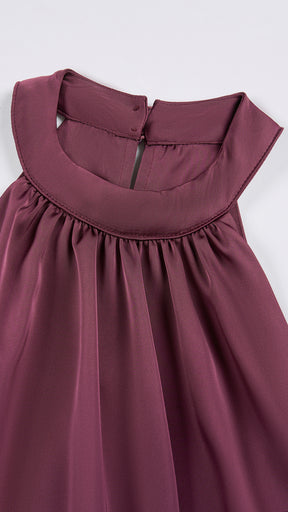 Abito lungo elegante con scollo a collo alto, senza maniche, in raso fluido, per cerimonie e occasioni speciali
