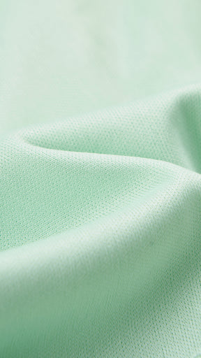 Abito corto elegante a spalline sottili con scollo a fascia, tessuto jacquard floreale e dettaglio a croce sul retro