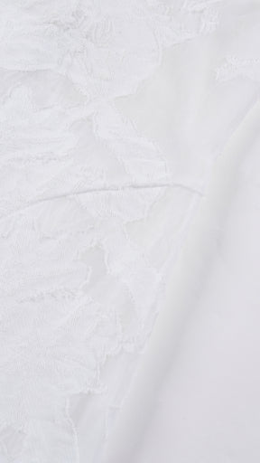 Abito midi elegante a spalline sottili con scollo a fascia, tessuto jacquard floreale e dettaglio a croce sul retro