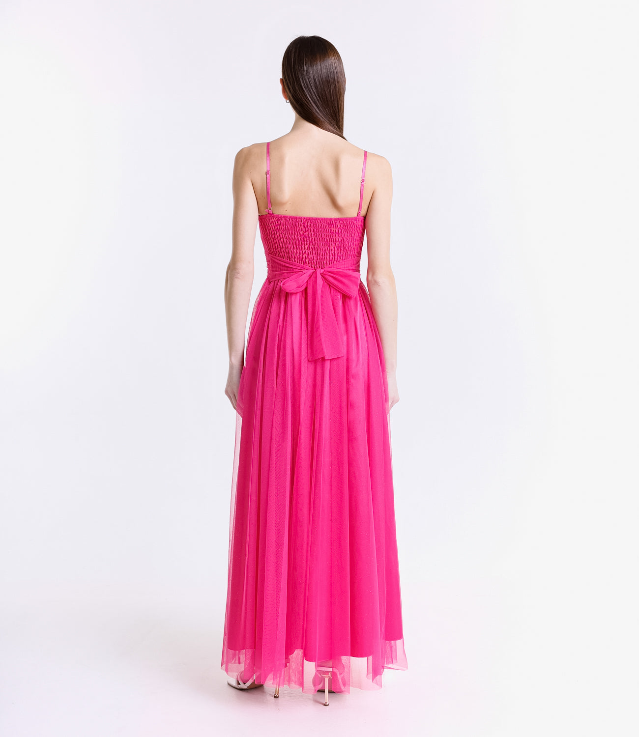 Abito da cerimonia fuxia in tulle trasparente, design audace