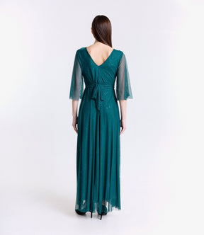 Abito da cerimonia ottanio con maniche di tulle e design avvolgente