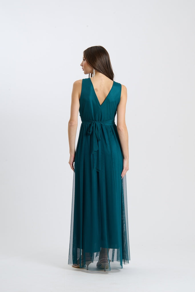 Abito da donna ottanio, taglio fluido senza maniche, scollatura a V profondo, perfetto per un look sofisticato.
