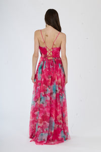 Abito da sera fuxia, stile fluido con stampa colorata, spalline sottili e scollatura a V