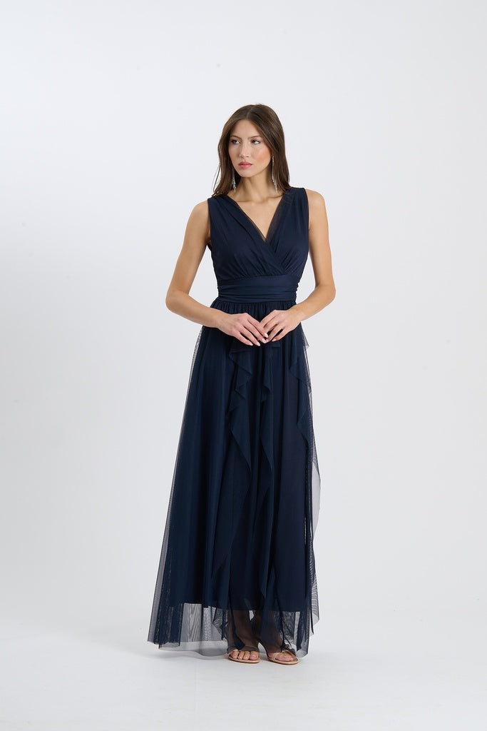 Abito lungo senza spalline di colore navy, scollatura a V incrociata, gonna fluida con tessuto trasparente, perfetto per eventi formali.
