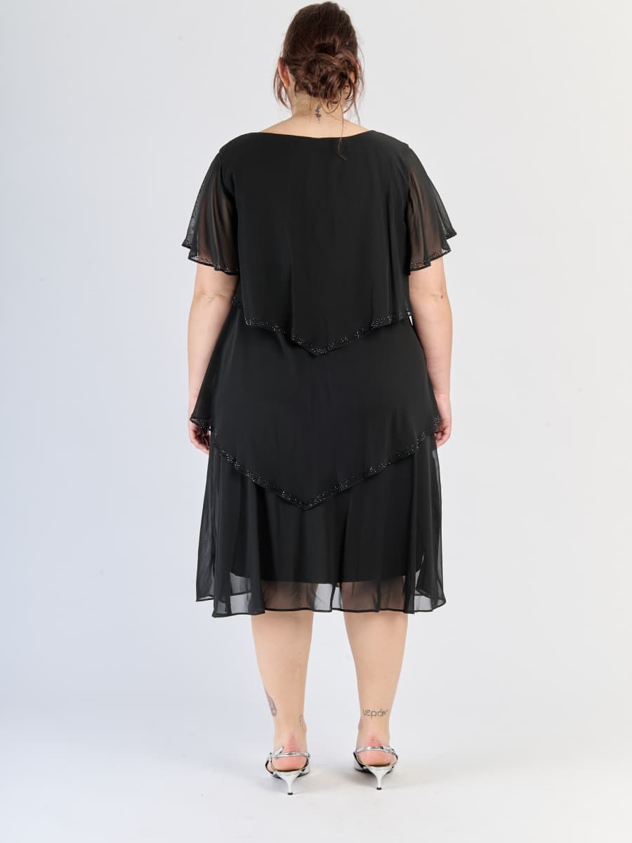 Abito nero formale, chiffon traslucido, design a livelli e maniche scollate