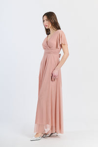 Abito rosa antico trasparente, ideale per eventi glamour