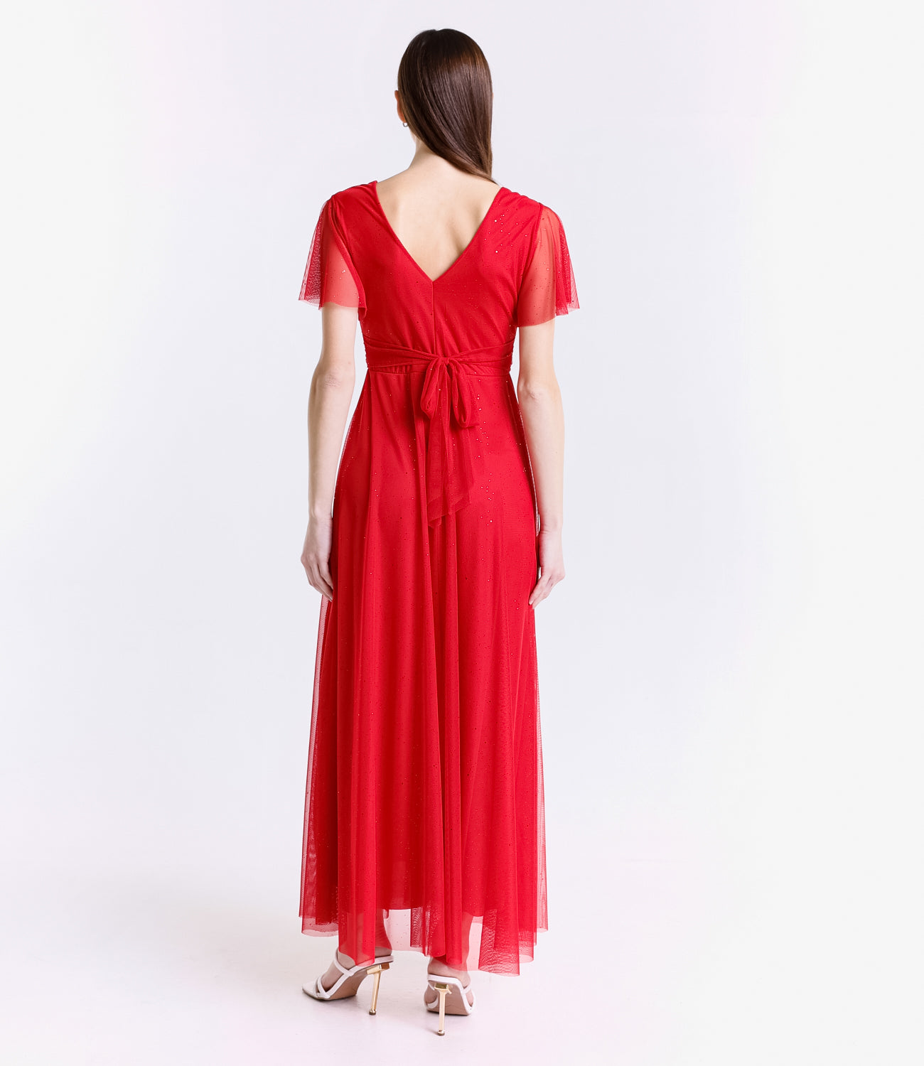 Abito rosso trasparente, ideale per occasioni glamour