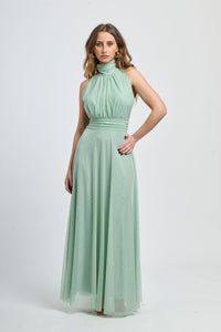 Abito salvia a puzzo con volantino al collo medio, ideale per passeggiate in giardino botanico.